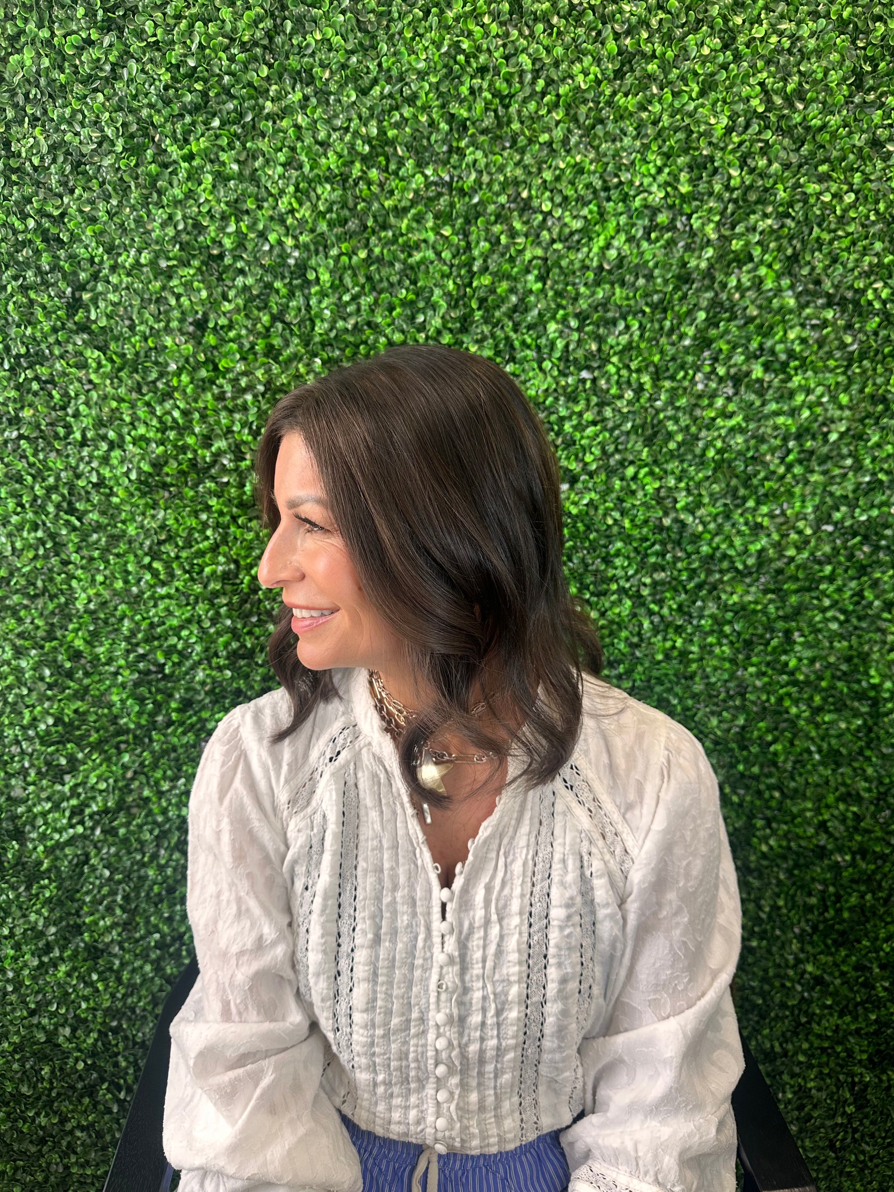 Woman wearing natural-looking hairline coverage